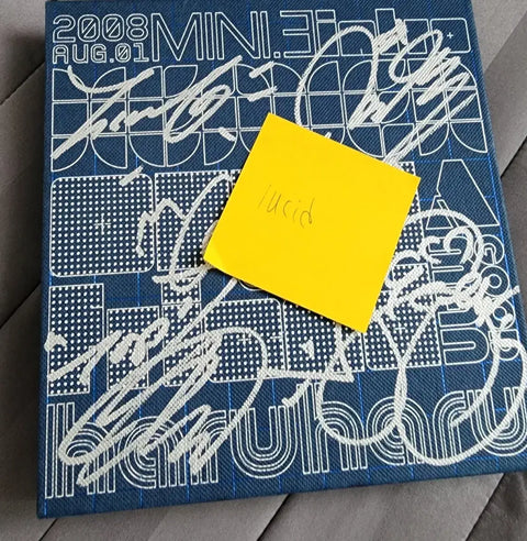 Big Bang Day by Day album with autographs from all former members.