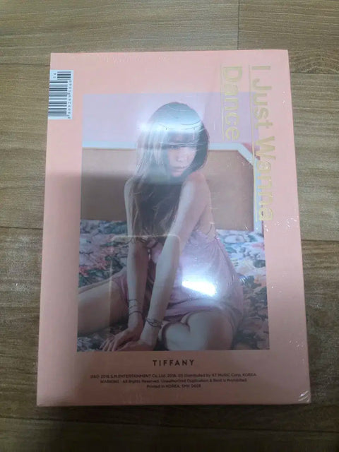 Selling Tiffany's debut mini album "I Just Wanna Dance" (unopened).