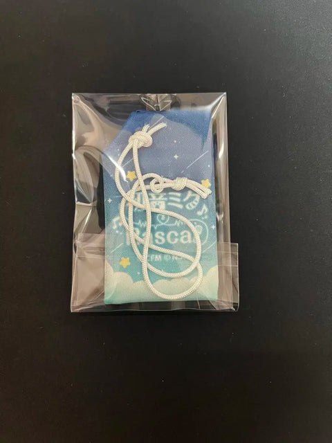 Selling Vocaloid Miku charm omikuji.