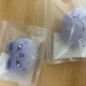 Pretty neck doll keyring, new condition.